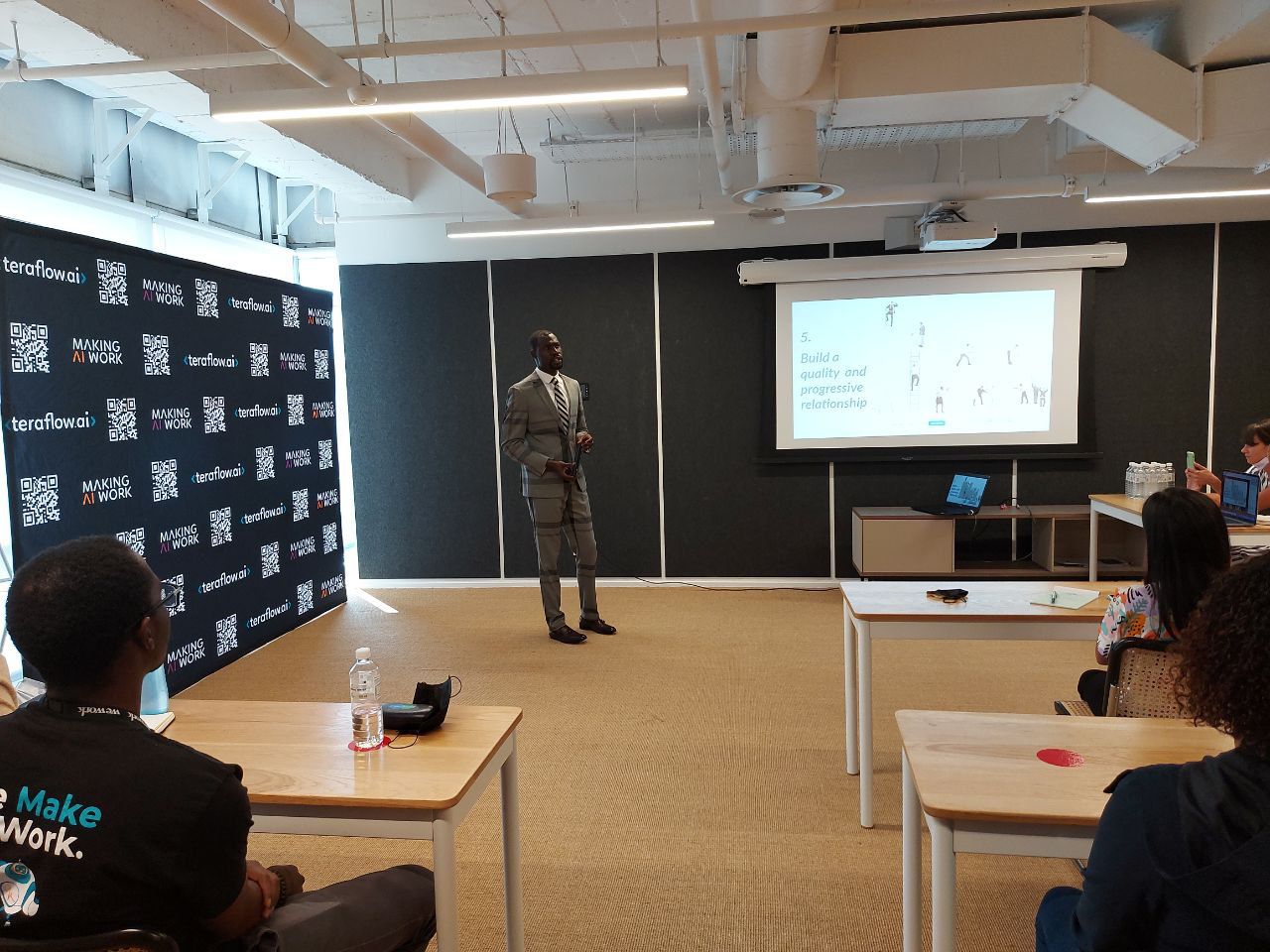 Daniel Cole speaking at a workshop